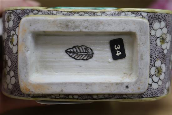 A 19th century Chinese enamelled biscuit Fu wine pot and cover, repaired